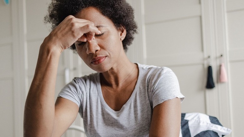 Woman having stressful thoughts