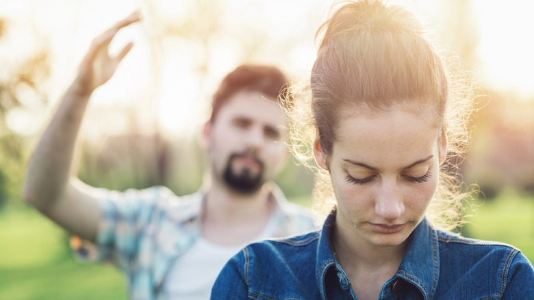 couple fighting outdoors