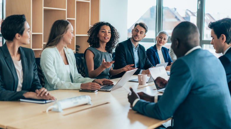 Business woman leading a discussion
