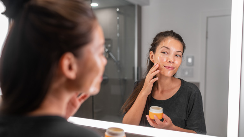 Woman washing her face 