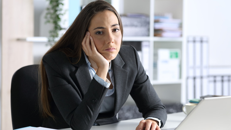 Corporate woman looking bored