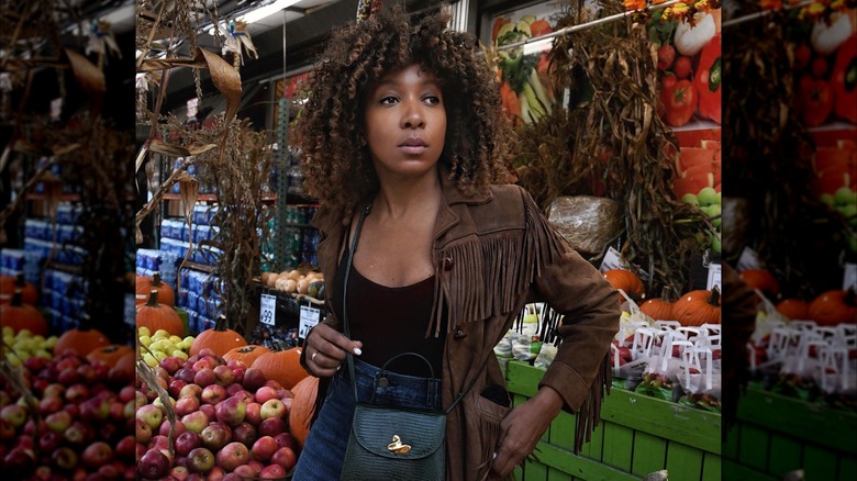 Woman in a fringe jacket