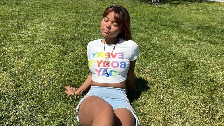 Woman wearing a Yitty Pride shirt