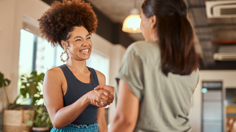 Women shaking hands