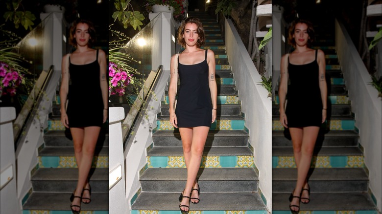 woman wearing black dress