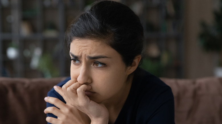 A woman looking worried 